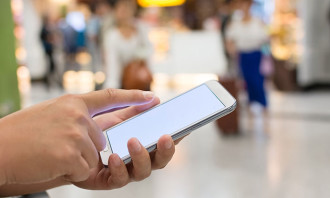 Shopping mall while on mobile 123rf